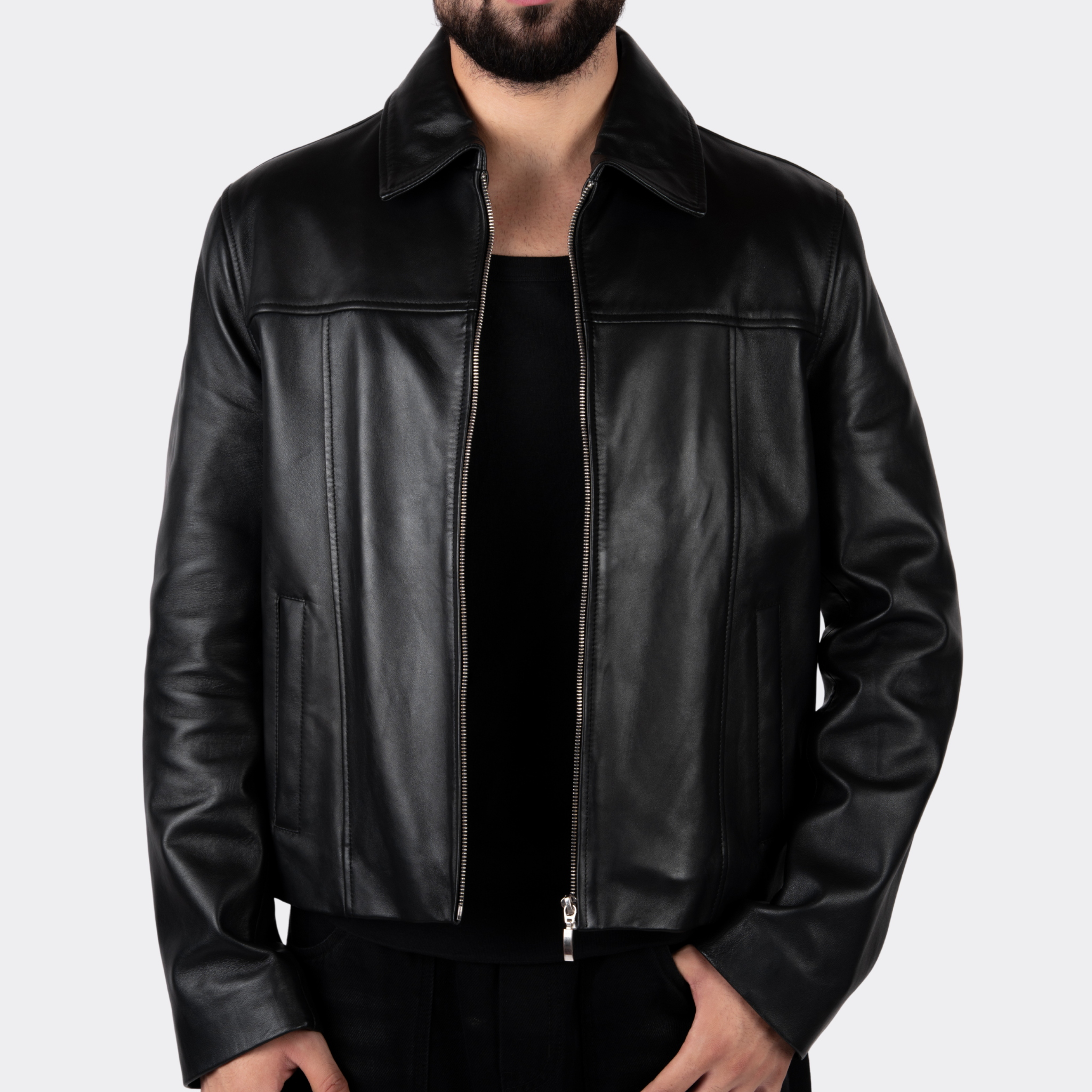 Black leather jacket worn by a person on a white background Blaatan The Axiom Classic Edition Obsidian Black Streetwear Leather Jacket for Men