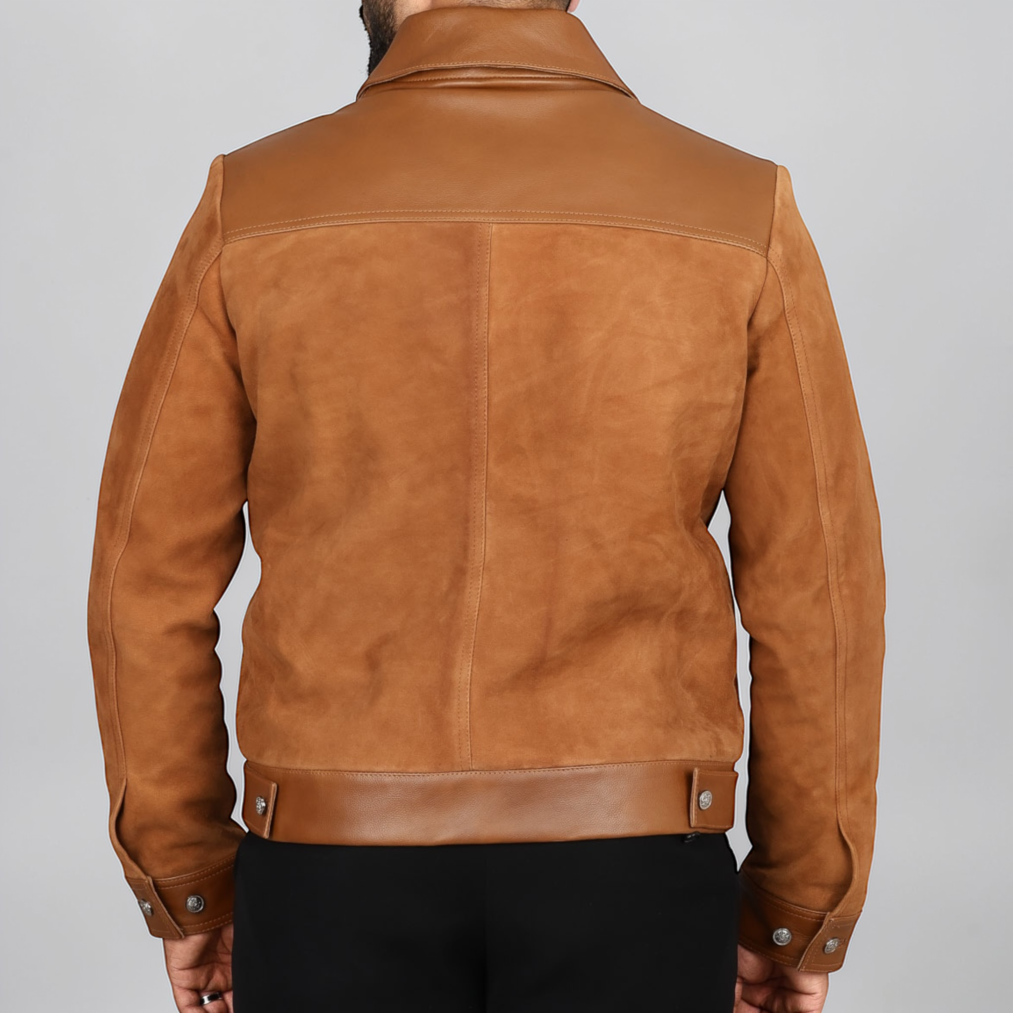 Brown Suede leather jacket worn by a person on a gray background By Blaatan