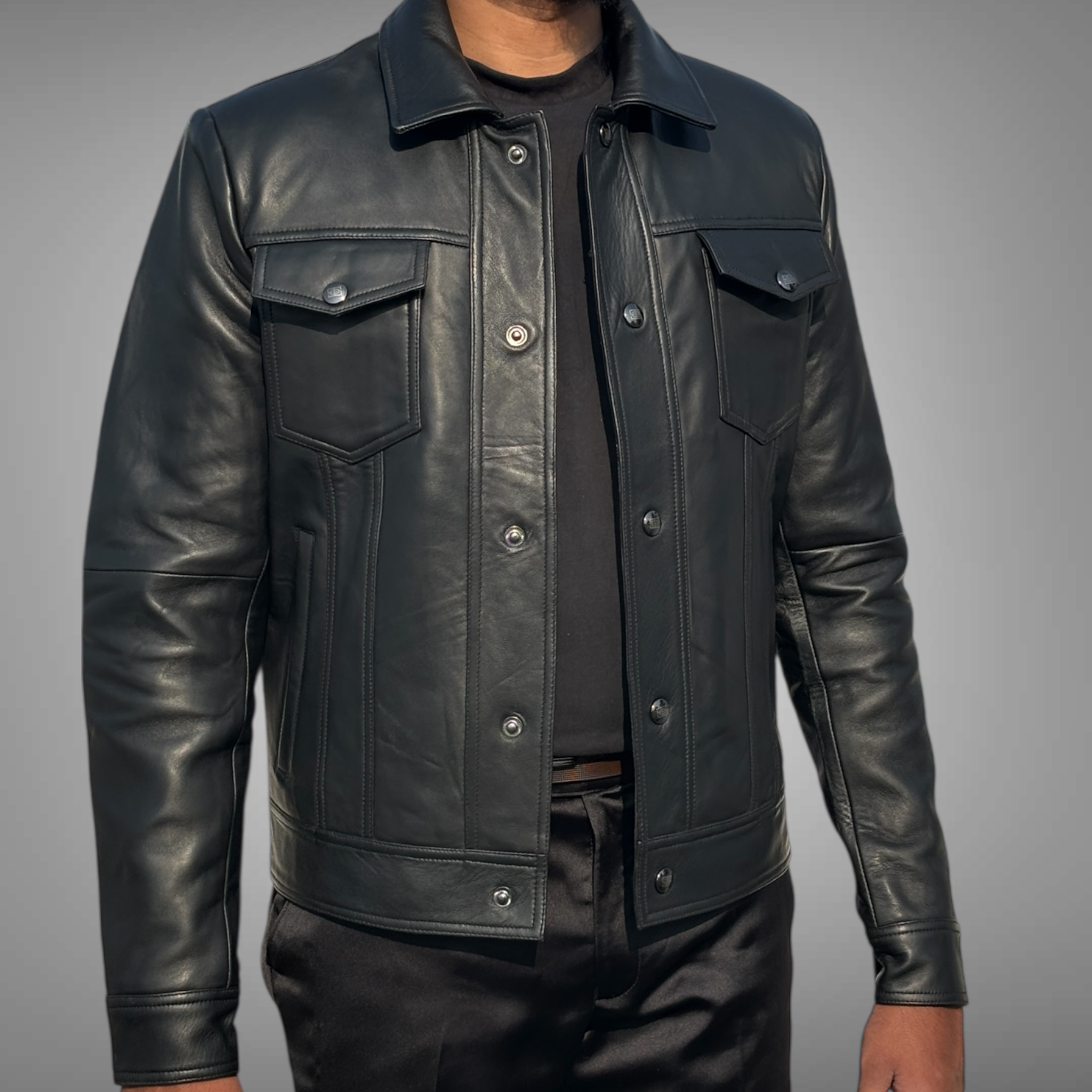 Black leather jacket worn by a person on a gray background Blaatan The Drover Midnight Edition Obsidian Black Casual Leather Jacket for Men