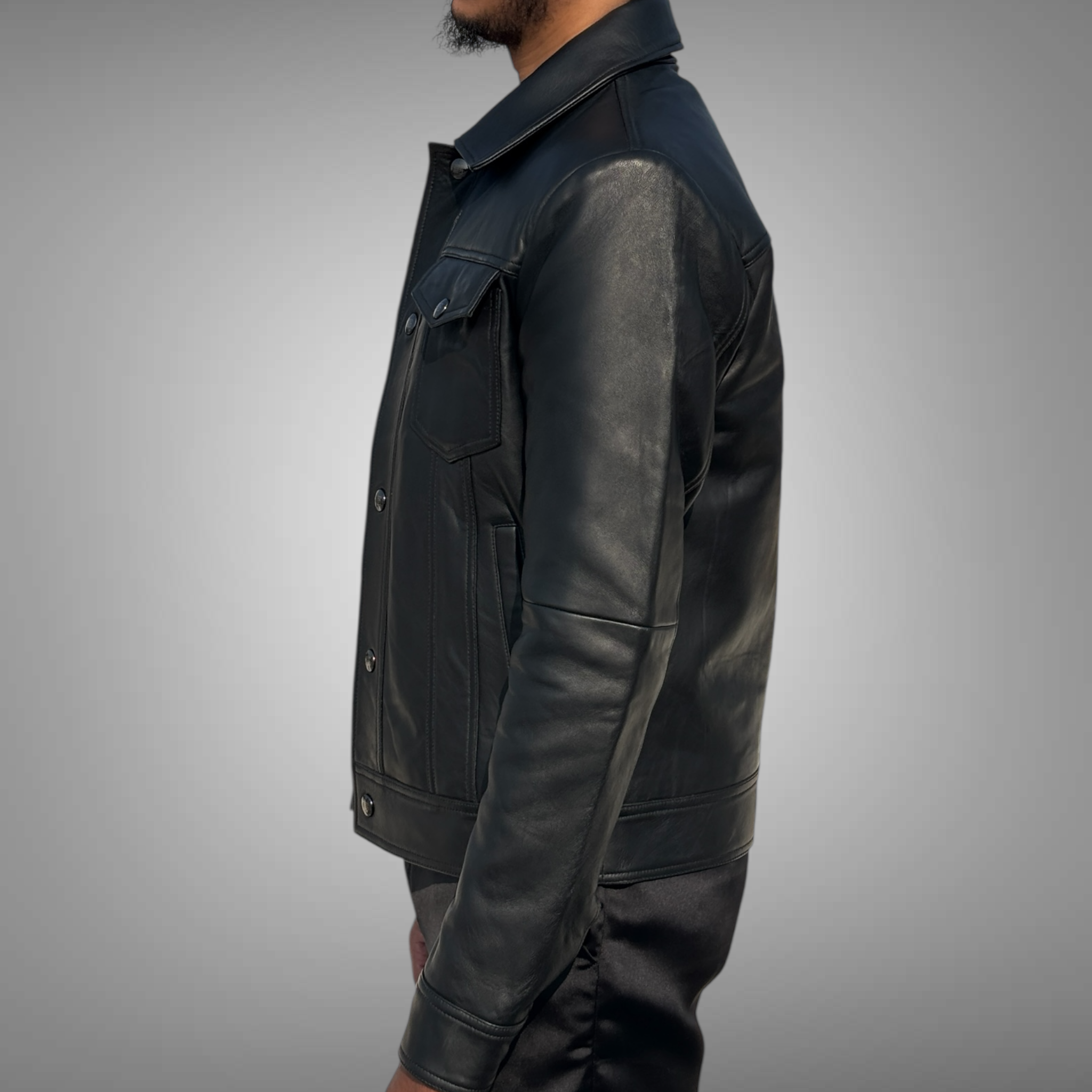 Black leather jacket worn by a person on a gray background Blaatan The Drover Midnight Edition Obsidian Black Casual Leather Jacket for Men